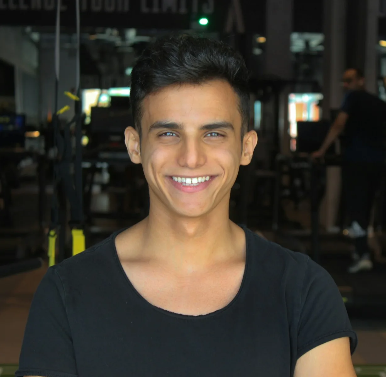 woman in black crew neck t-shirt smiling